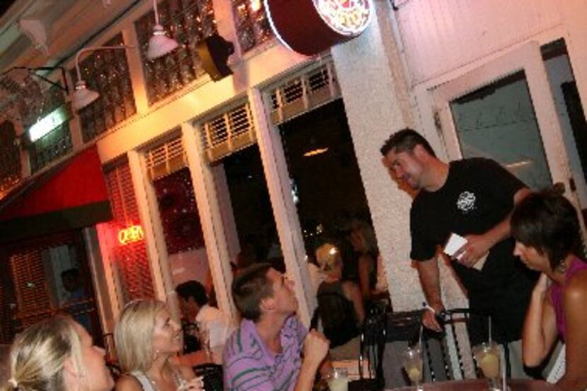 Guests mingle at Primo's, a Dallas hot spot, in 2008.