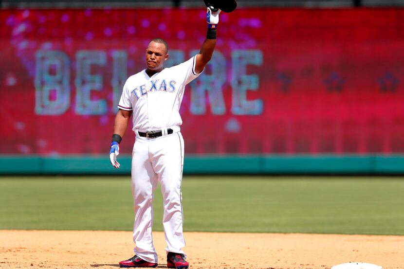 Texas Rangers Adrian Beltre (29) waves to crowd after achieving his 3,000 career hit in the...