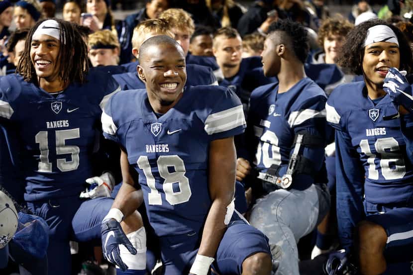 Frisco Lone Star wide receiver Marvin Mims (18) is all smiles following his record-breaking...
