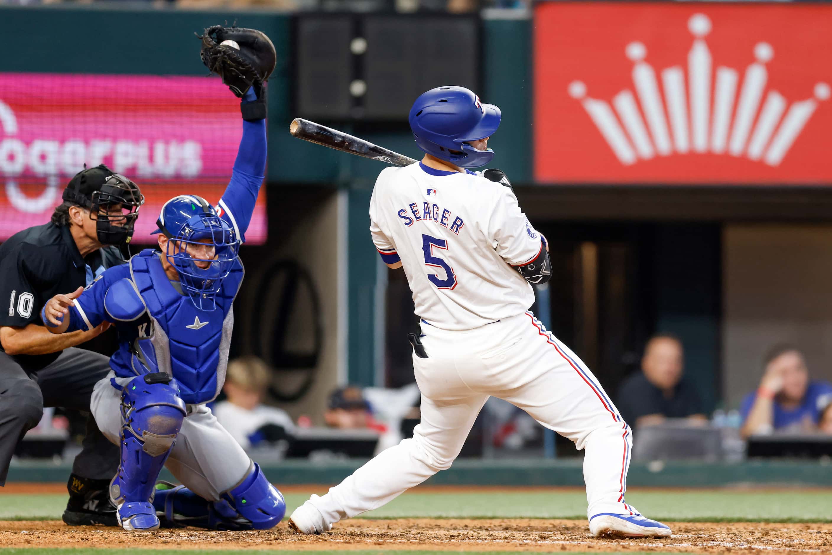 Texas Rangers shortstop Corey Seager (5) avoids a pitch during the seventh inning of an MLB...