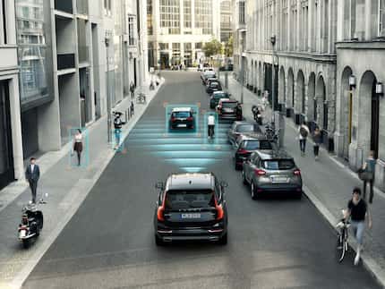 A rendering of Volvo's city safety feature in one of its XC90 SUVs. The feature detects...