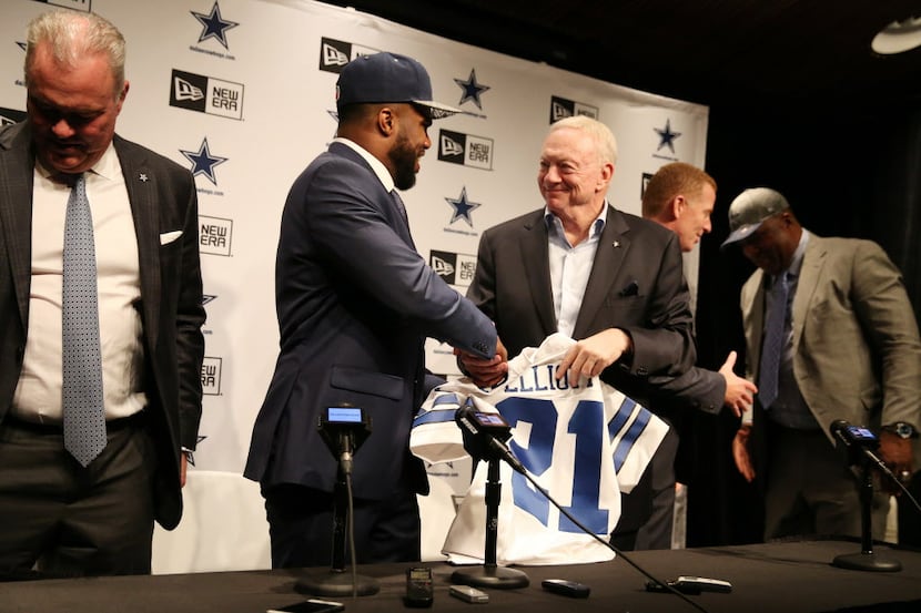 Running back Ezekiel Elliott, who played for Ohio State, shakes hands with Dallas Cowboys...
