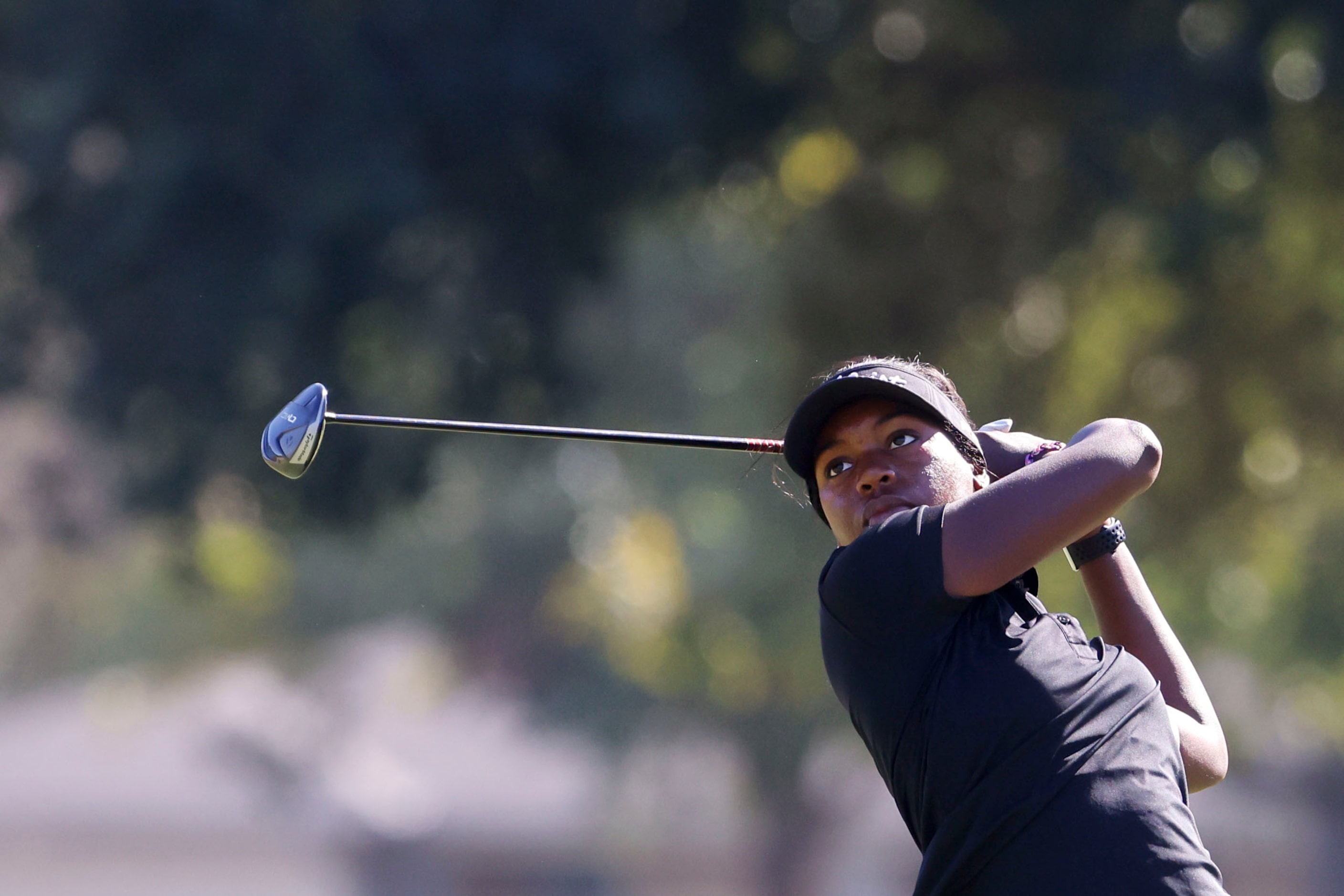 Shyla Brown of McKinney, tees off on the second hole during the Southwest Airlines Showcase...