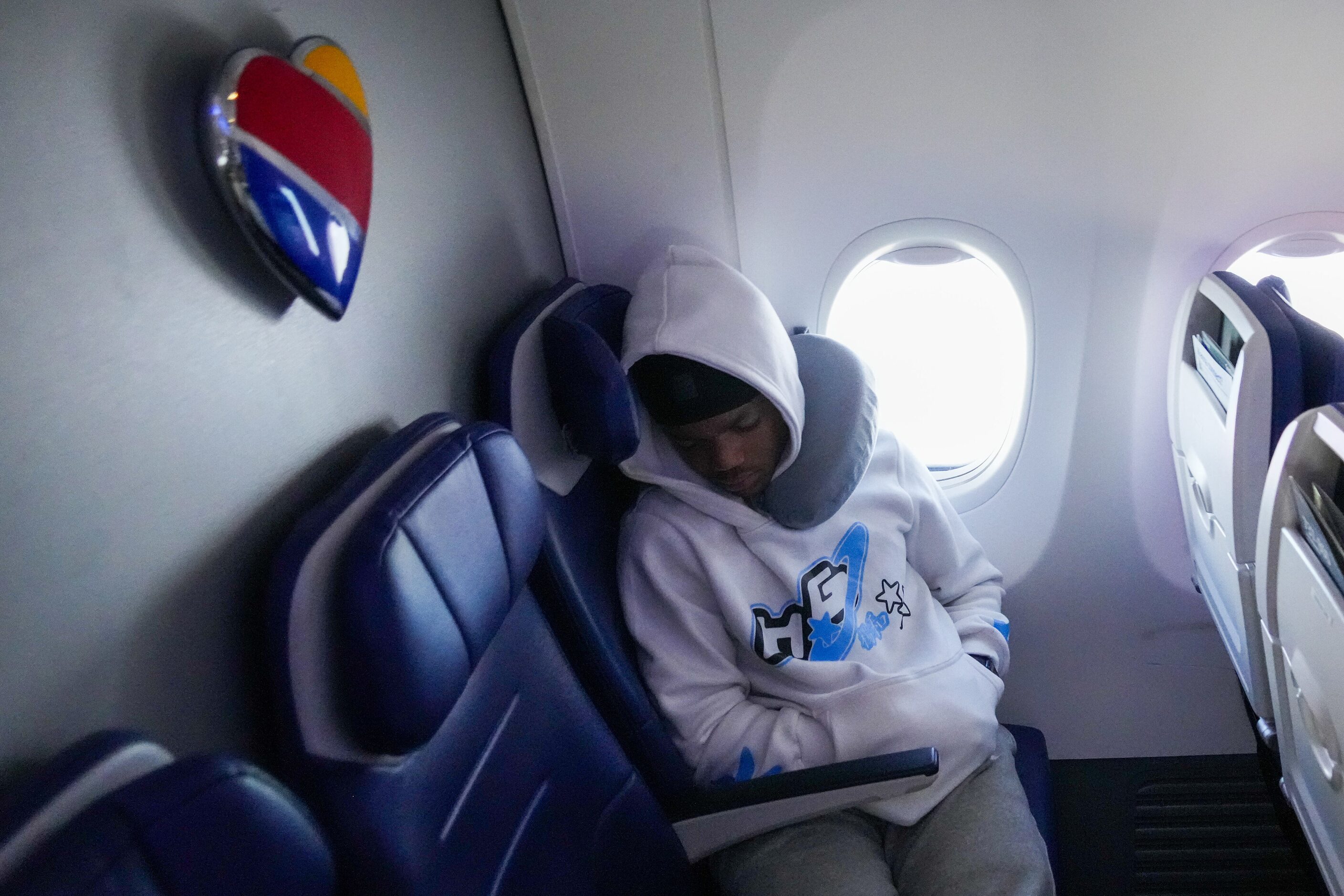 Emory Brewster snoozes in the last row of Southwest Flight #1252 from Dallas to Pittsburgh...