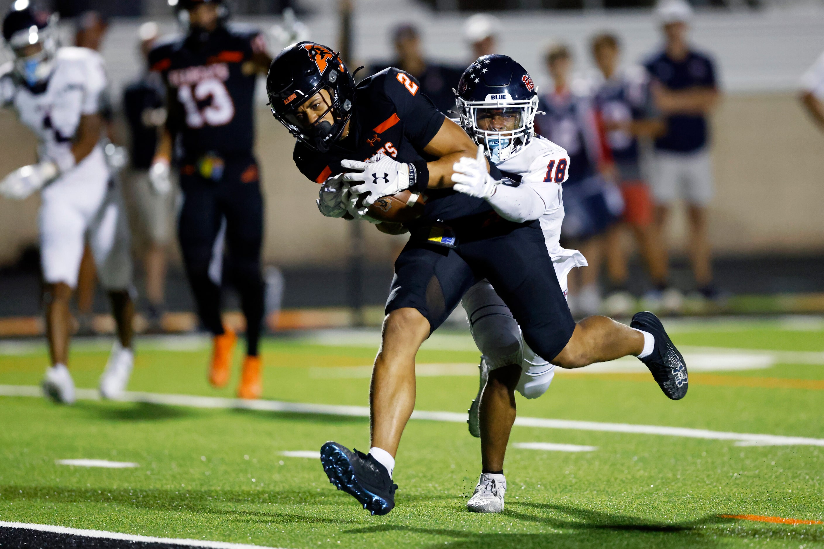 Aledo wide receiver Kaydon Finley (2) runs after a catch into the end zone for a touchdown...