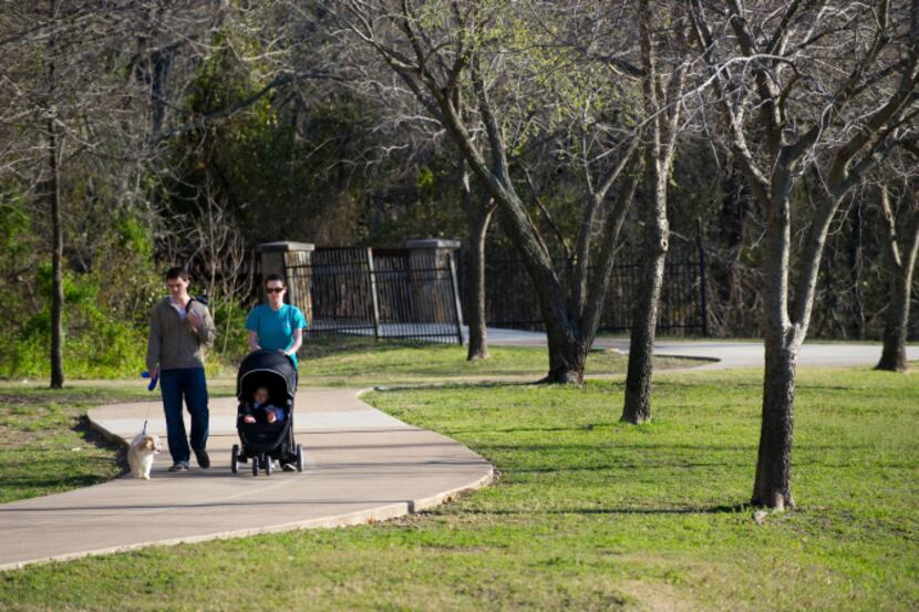 Cody and Karissa Kell took a walk with their 8-month-old daughter, Audrey, and dog Kyra at...