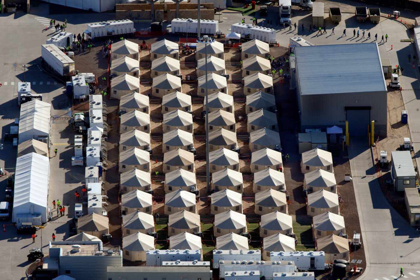 An aerial photo shows the Health and Human Services temporary encampment for migrant...