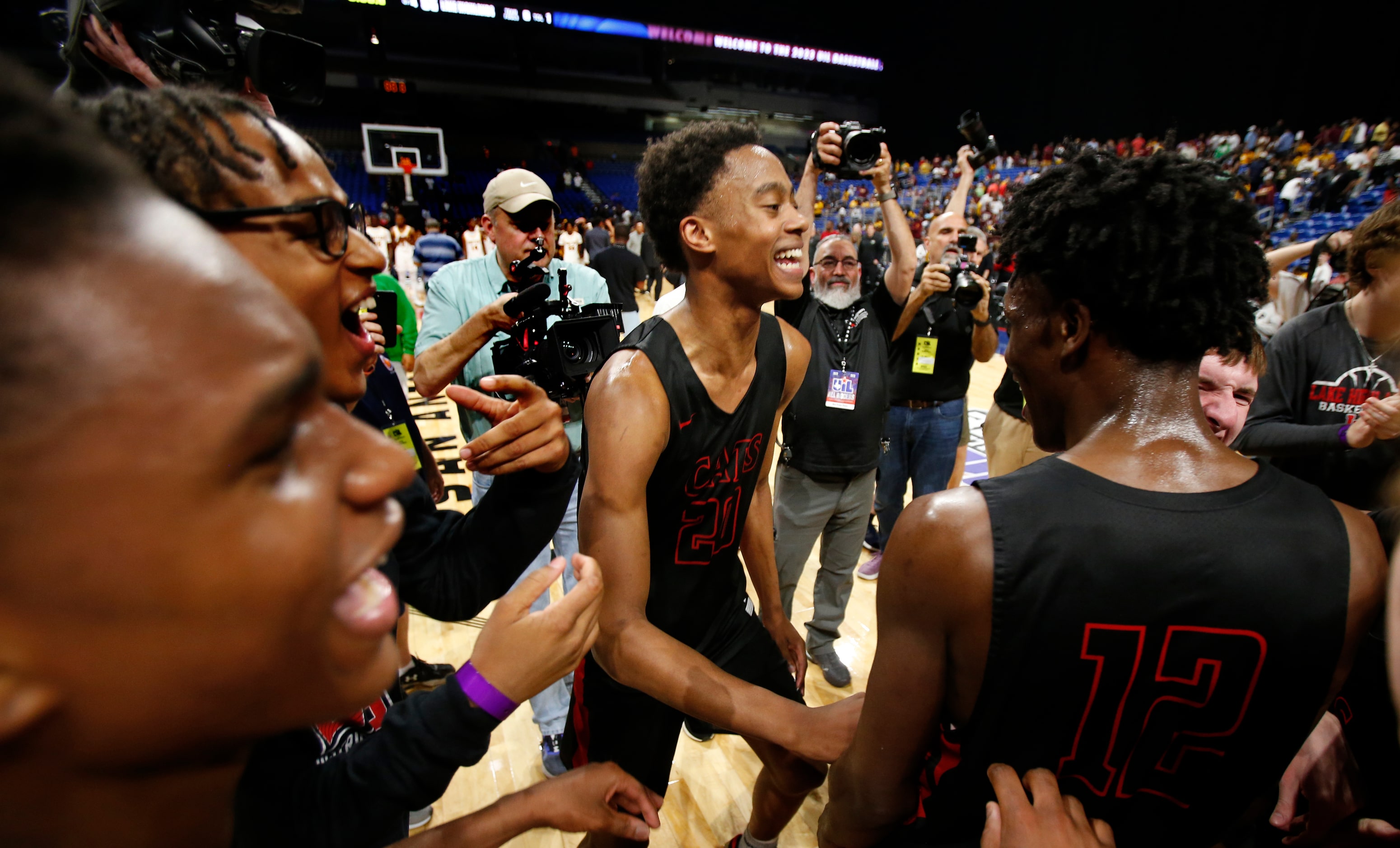 Lake Highlands Tre Johnson (20), MVP, celebrates with the rest of the team. Lake Highlands...