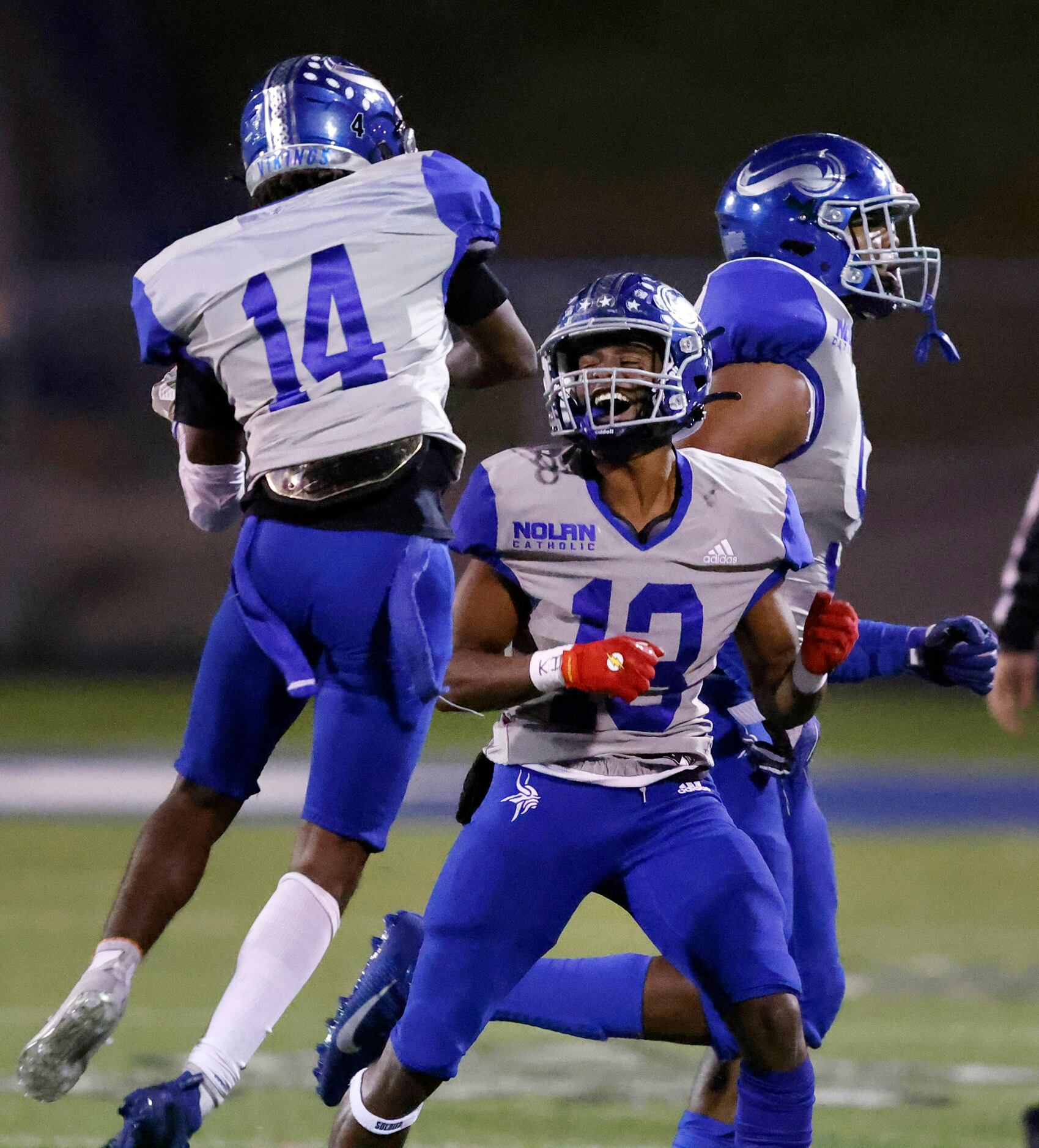 Fort Worth Nolan Tre Parks -Vinson (13) and Tramell Windham(14) celebrate a fourth quarter...