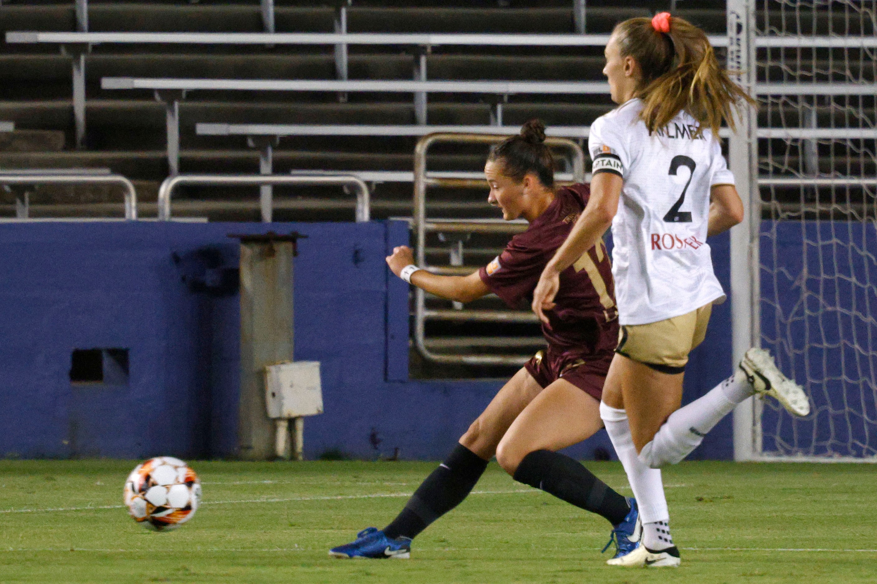 Dallas Trinity forward Sealey Strawn (12) kicks the ball as Spokane Zephyr midfielder Taylor...