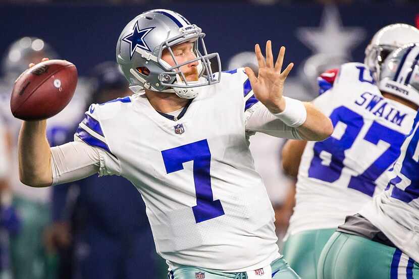 Dallas Cowboys quarterback Cooper Rush (7) throws a pass during the second quarter of a...