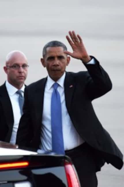  Obama waves after arriving in Oklahoma on Wednesday. He will become the first sitting...