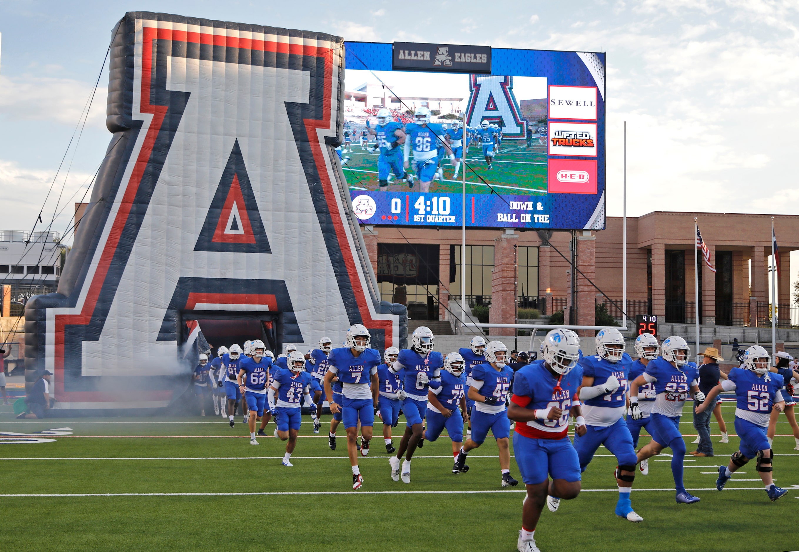 The Allen Eagles take the field before kickoff as Allen High School hosted Cedar Hill High...