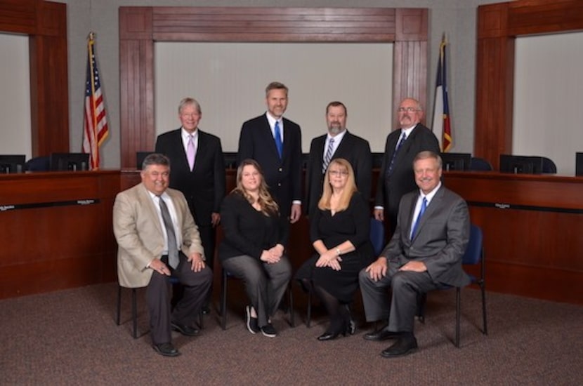 Randy Armstrong (front row at right) has been school board president since 2012. He's...