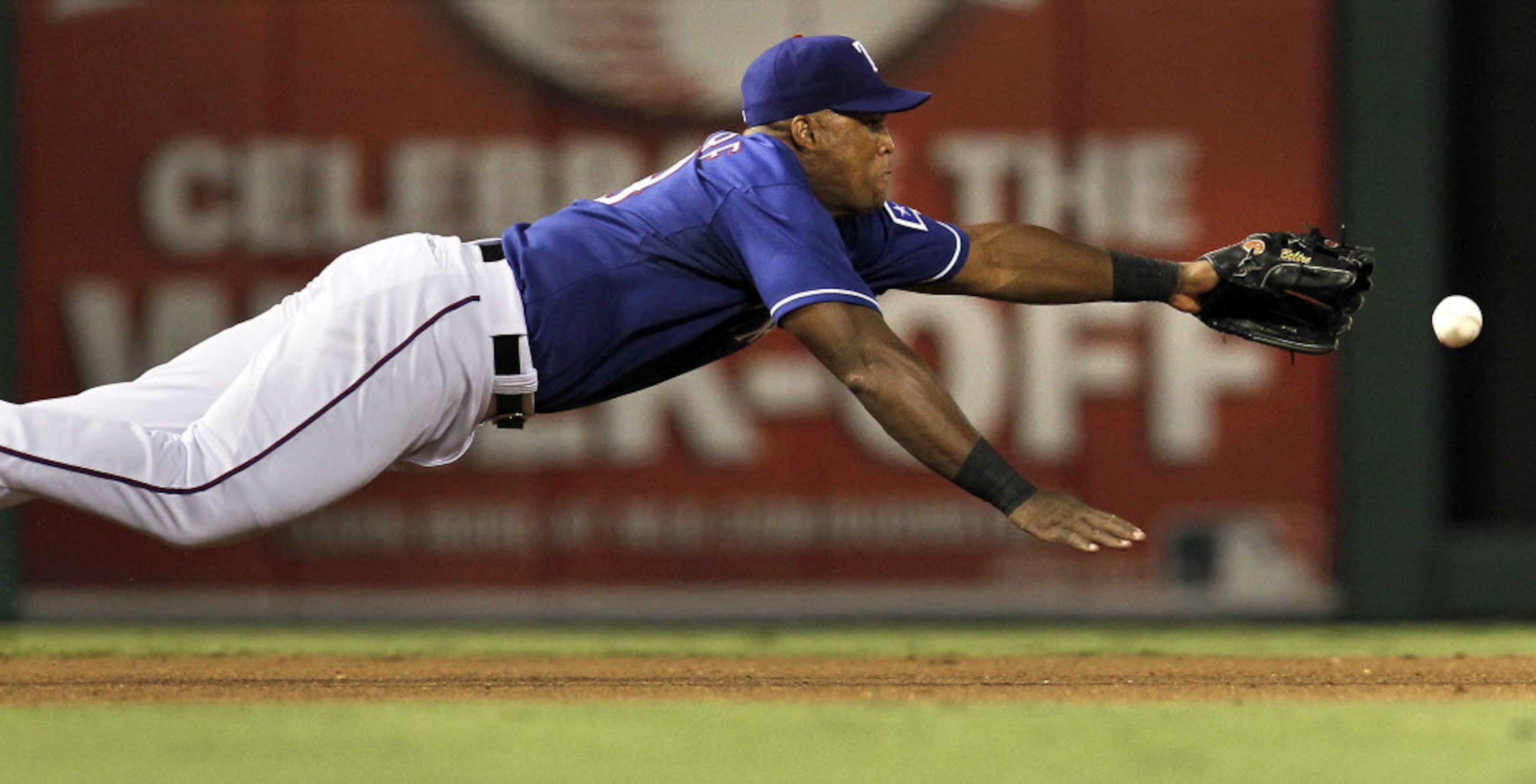 Texas Rangers third baseman Adrian Beltre (29) can't reach a ball hit by Pittsburgh Pirates...