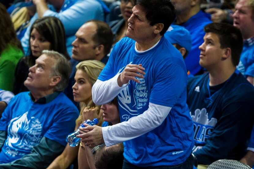 Dallas Mavericks owner Mark Cuban reacts to a call from the sidelines during the fourth...