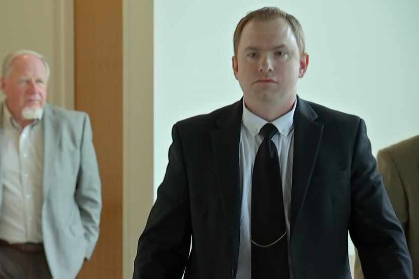 Aaron Dean is seen at the Tom Vandergriff Civil Courts Building in Fort Worth.