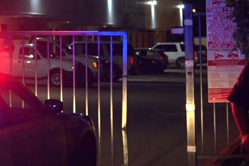 A gate lies open at a business near where a man was shot Wednesday morning in far northeast...