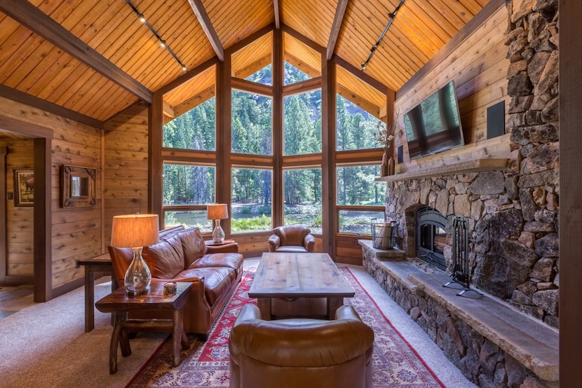 Guests at the Triple Creek Ranch in Montana stay in 25 log cabins, combining modern comforts...