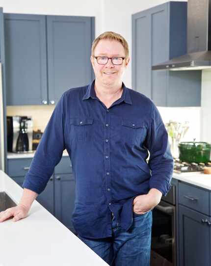 Home owner Scott Jones in the kitchen of his townhouse built by Larkspur Capital Partners.
