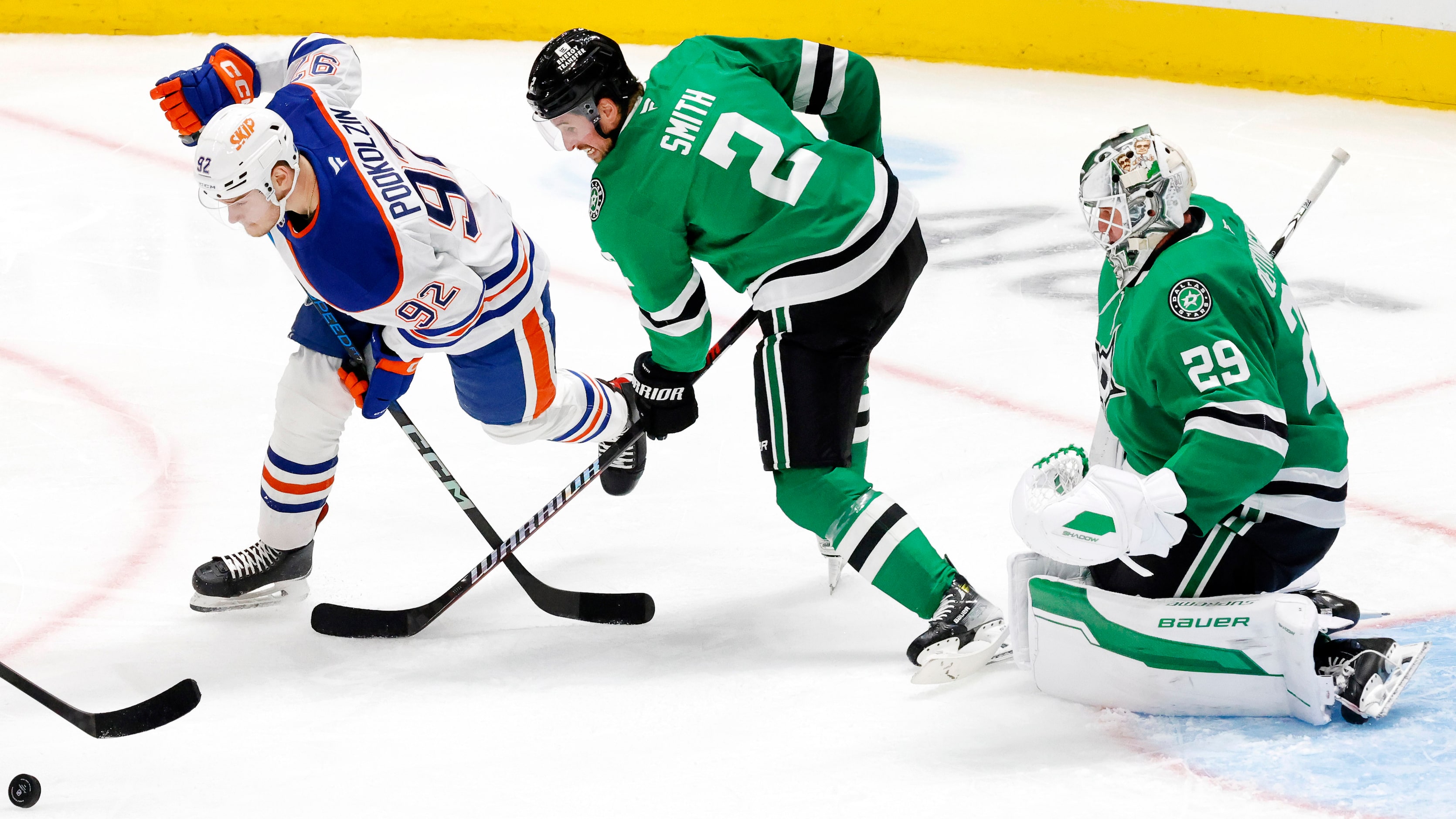 Dallas Stars defenseman Brendan Smith (2) flips the puck away from Edmonton Oilers right...