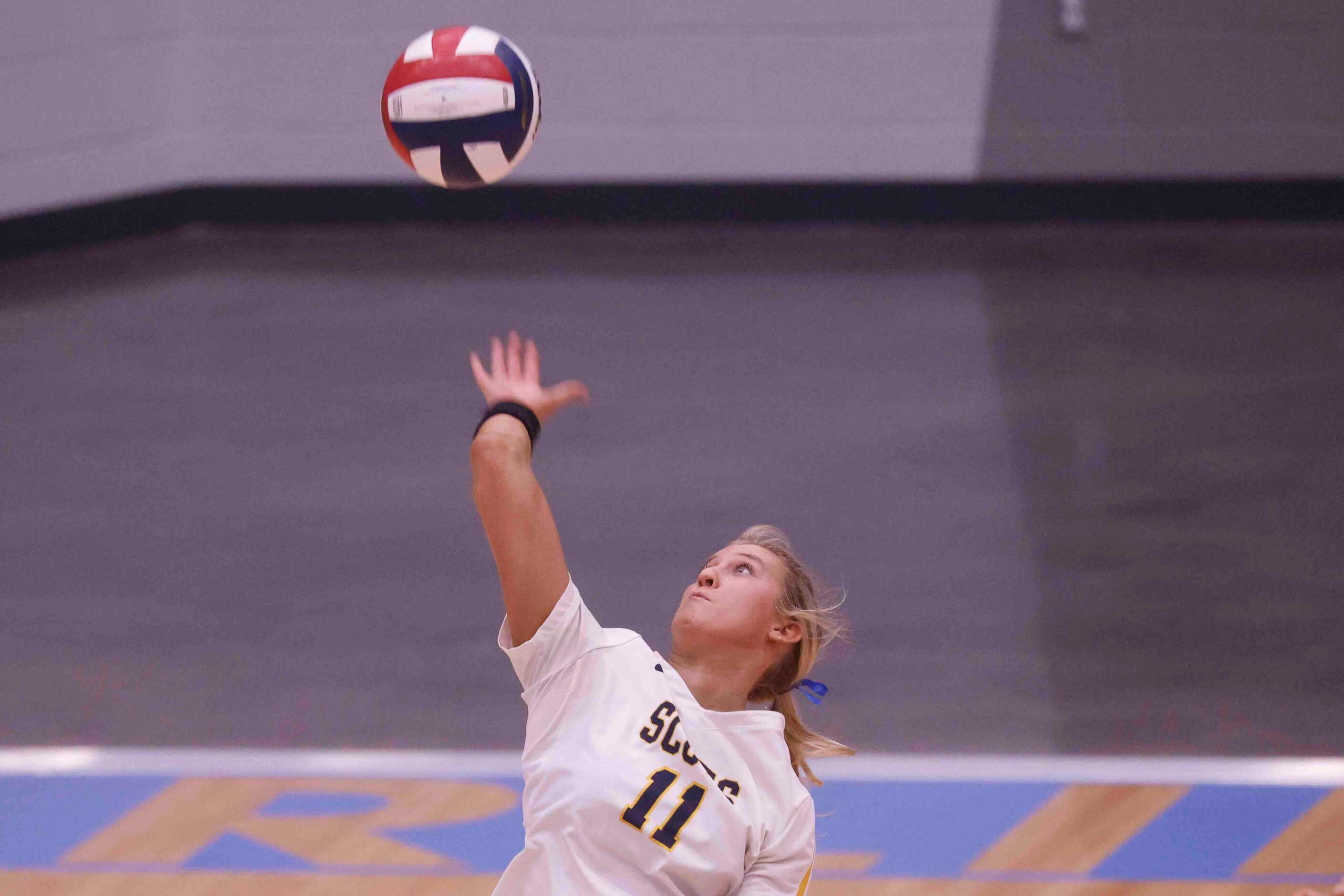 Highland Park’s Sydney Breon (11) hits the ball against Flower Mound during a volleyball...