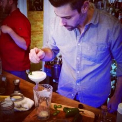 Bar manager Moses Guidry stirring up smoke.