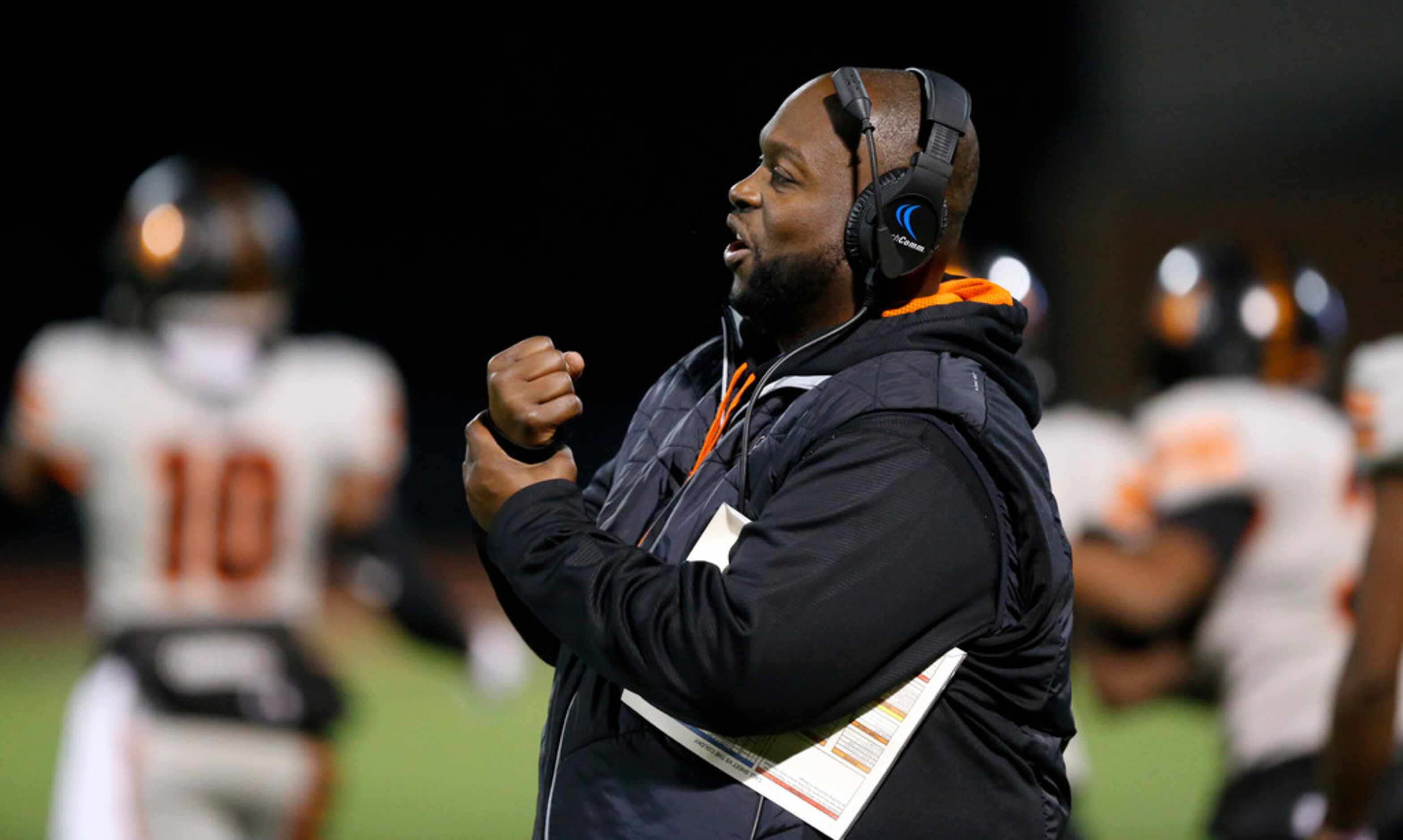 Lancaster head coach Chris Gilbert tries to tell the official there was a holding penalty on...