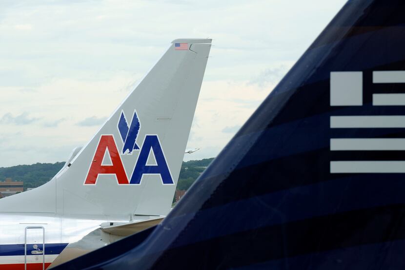 US Airways lead antitrust lawyer Rich Parker and other company representatives said...
