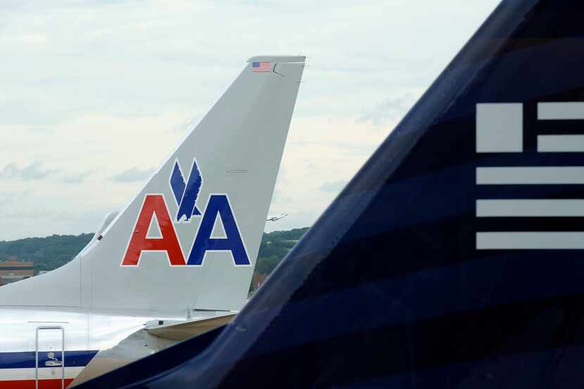 US Airways, American Airlines and the U.S. Department of Justice disclosed Monday that...