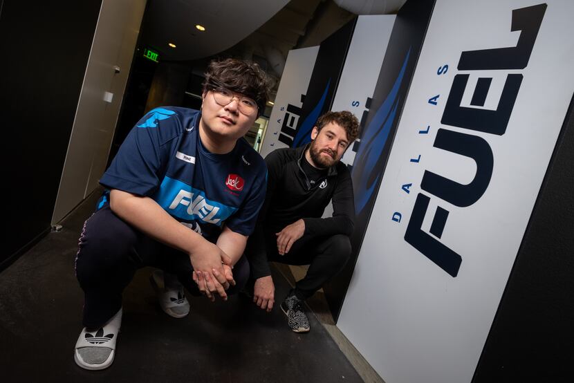 Dallas Fuel Damage Per Second player Do Hyeon "Pine" Kim, left, and team general manager Mat...