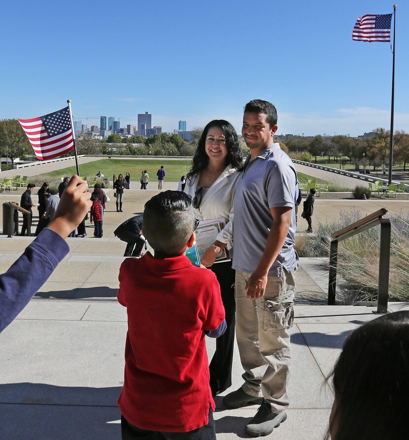 Norma Varela of Mexico poses for a photo with husband Fernando Pezina after she was sworn in...