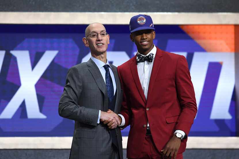 NEW YORK, NEW YORK - JUNE 20: Jarrett Culver poses with NBA Commissioner Adam Silver after...