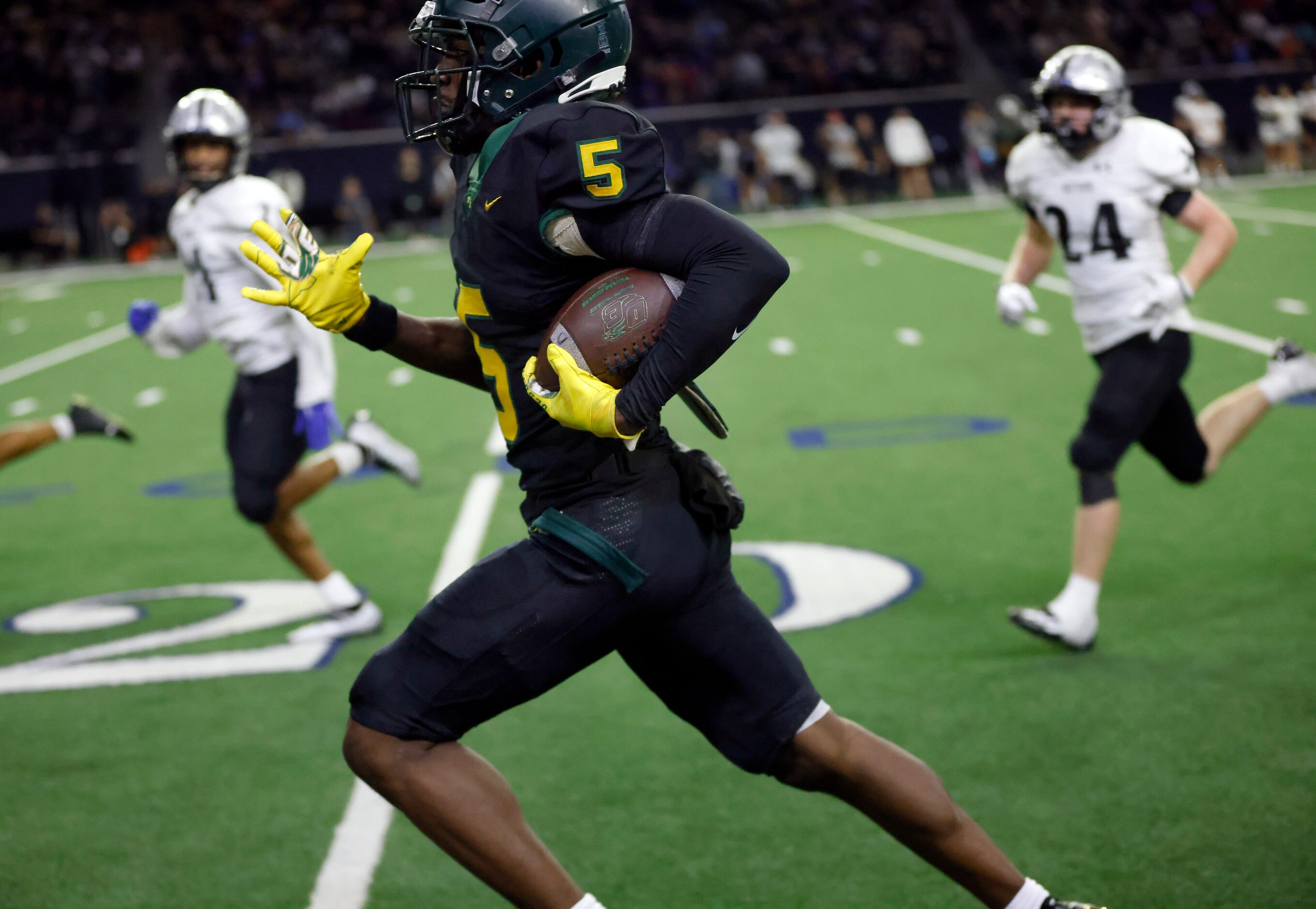 DeSoto running back Tre Wisner (5) races down the sideline on a big fourth quarter run...