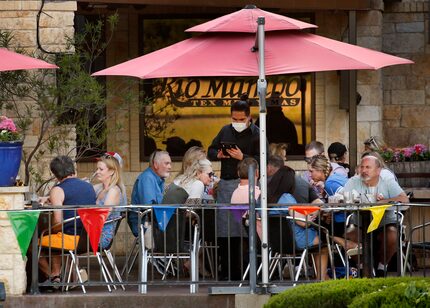 In late April, when restaurants reopened, diners packed the patio at Rio Mambo Tex Mex in...