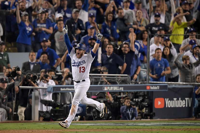 Los Angeles Dodgers' Max Muncy celebrates his walk off home run against the Boston Red Sox...
