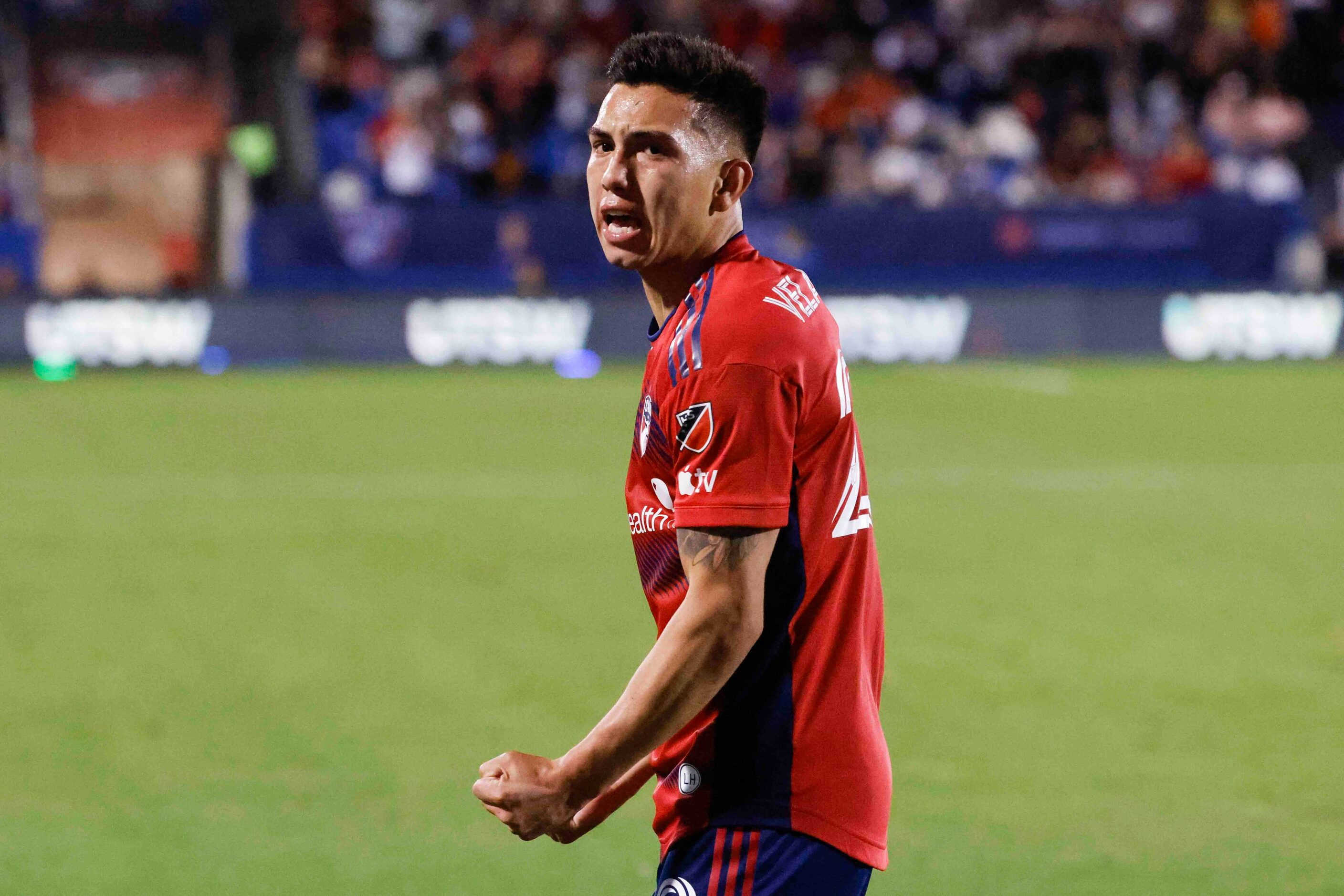 FC Dallas forward Alan Velasco (20) celebrates a goal during the first half of an MLS soccer...