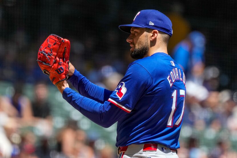 Texas Rangers pitcher Nathan Eovaldi throws during the first inning of a baseball game...