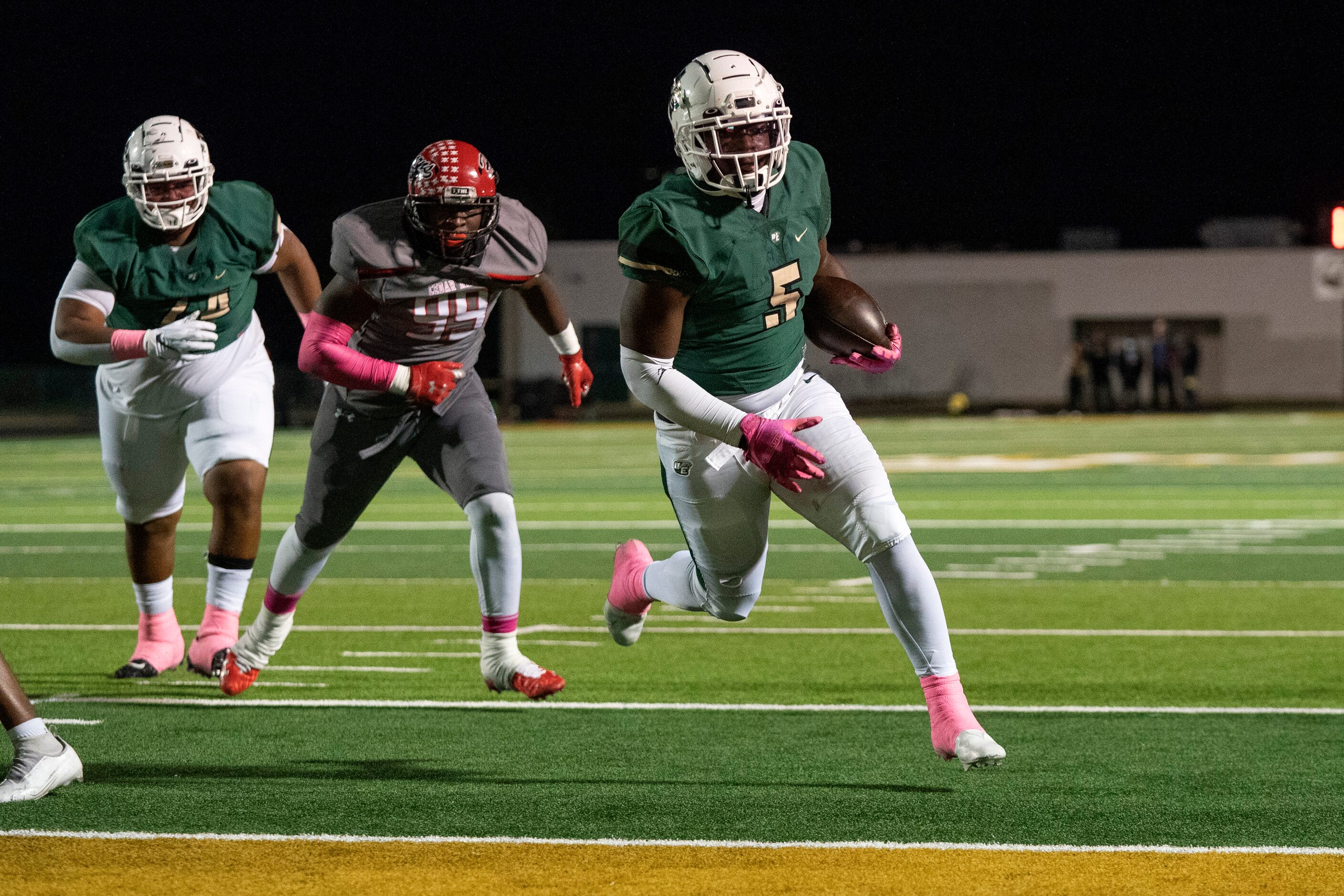 DeSoto senior running back Christopher Henley II (5) runs in for the first touchdown of the...