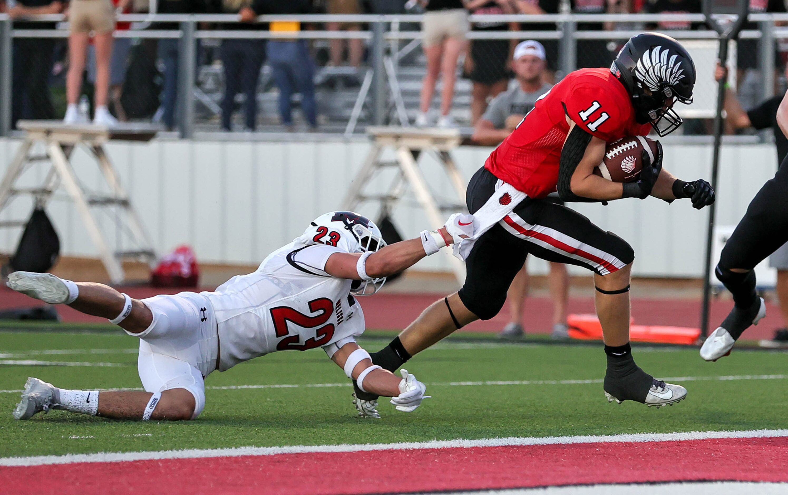 Argyle running back RJ Bunnell (11) gets into the end zone for a touchdown against Melissa's...