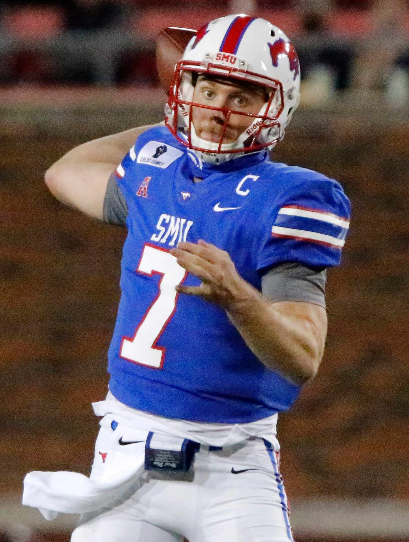 Southern Methodist Mustangs quarterback Shane Buechele (7) throws a pass during the first...
