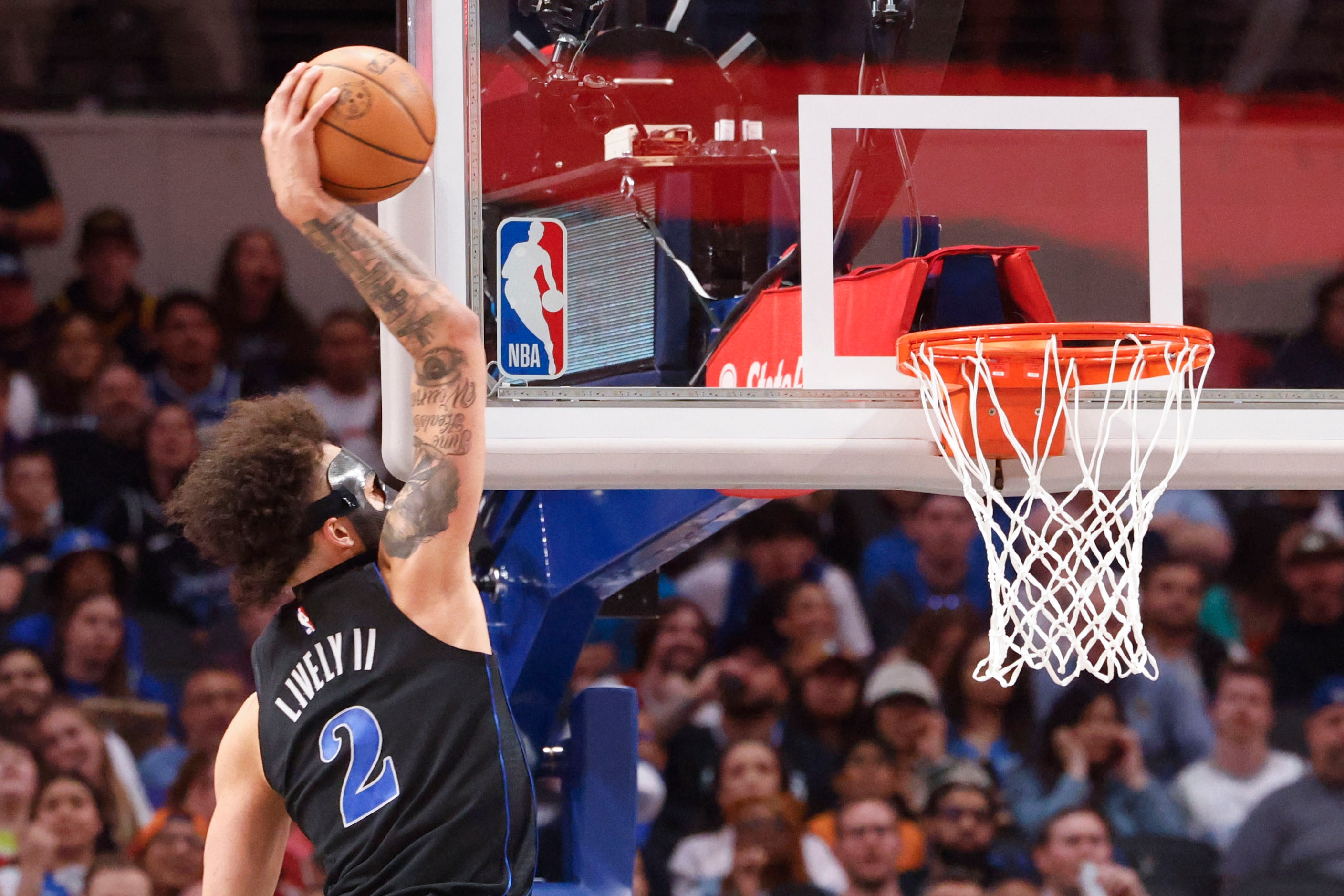 Dallas Mavericks center Dereck Lively II dunks against the Phoenix Suns during the first...