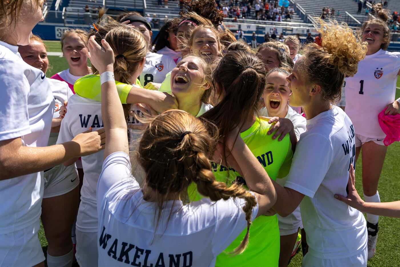 Frisco Wakeland celebrates a 3-0 win over Magnolia during a Class 5A girls soccer semifinal...