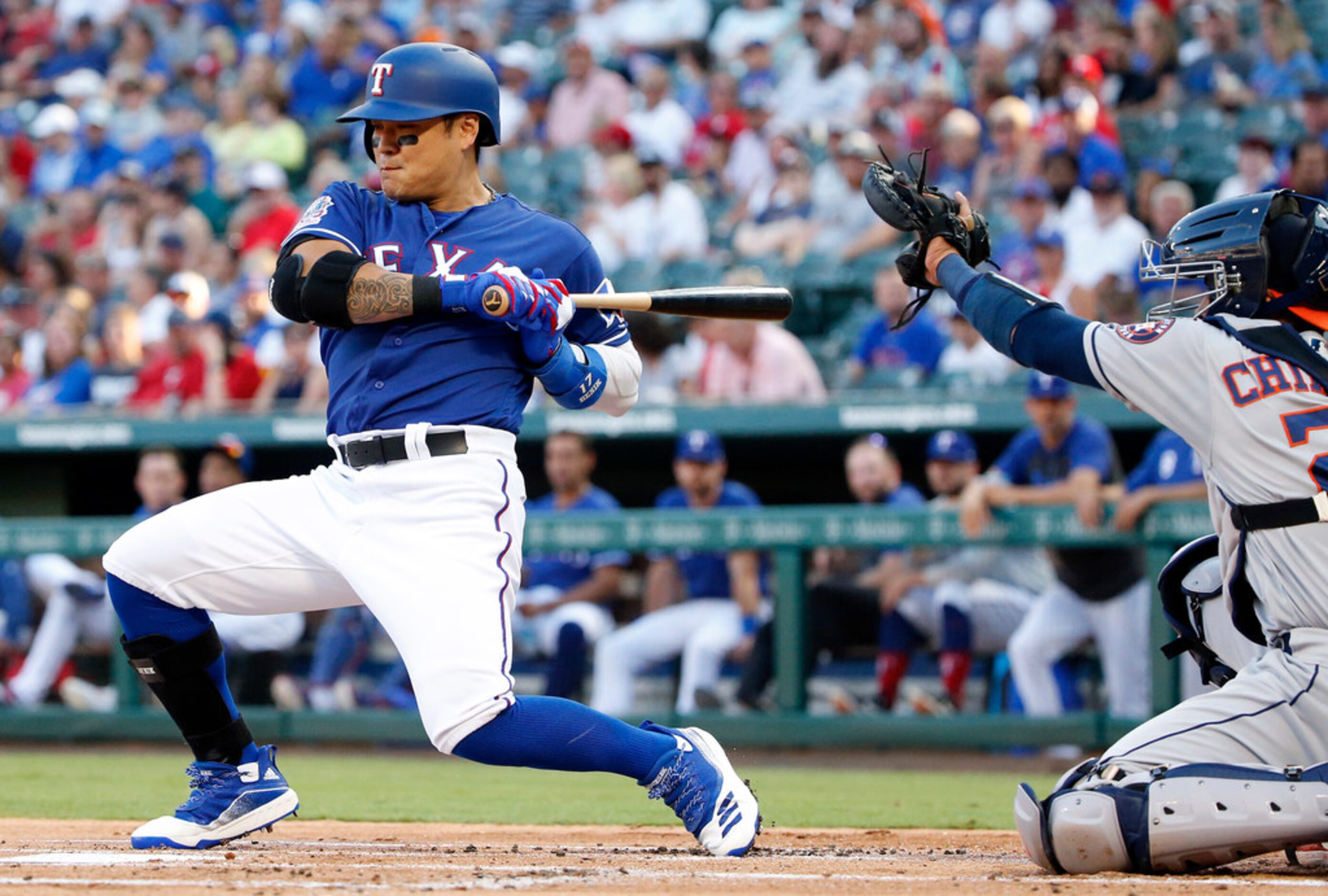 Texas Rangers left fielder Shin-Soo Choo (17) leans away from an inside pitch by Houston...