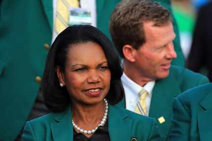 August National Golf Club member Condoleezza Rice looks on during the green jacket...