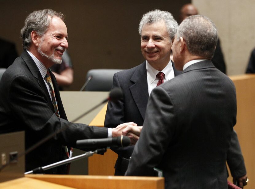 Warren Ernst, left, and City Manager A.C. Gonzalez, both of whom need to be replaced. 