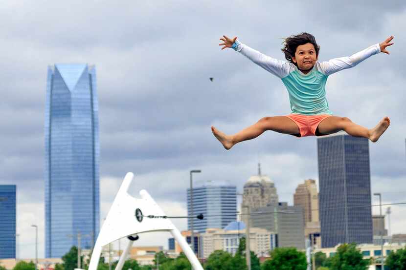 Sienna Fryhover, 7, gives it her all as she has fun in the adventure zone at Riversport...