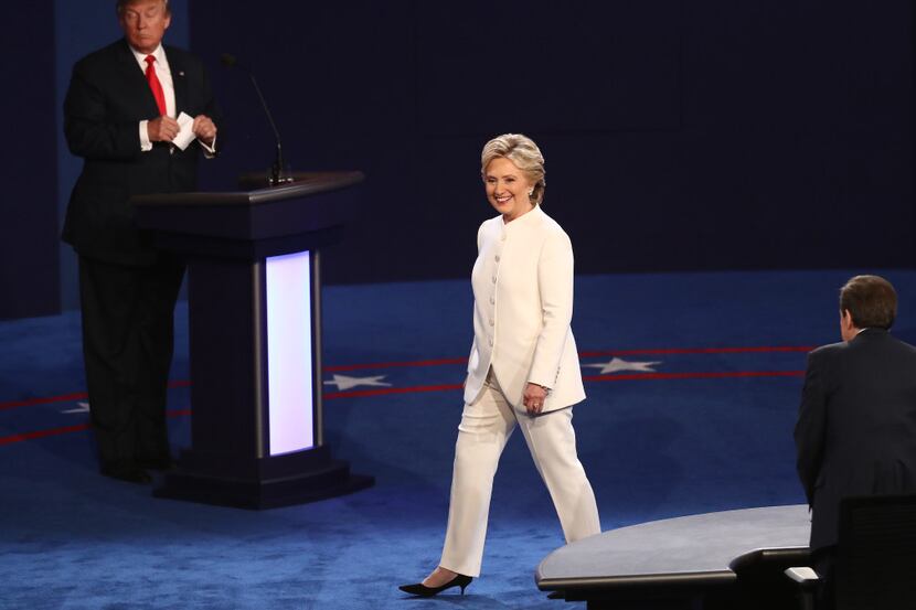 Democratic presidential nominee Hillary Clinton walks across the stage after the third U.S....