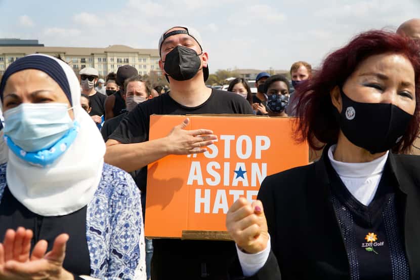 (l-r) Sabina Ibraheem, Mark Quach, and Kilja Park participated in the Stop Asian Hate rally...