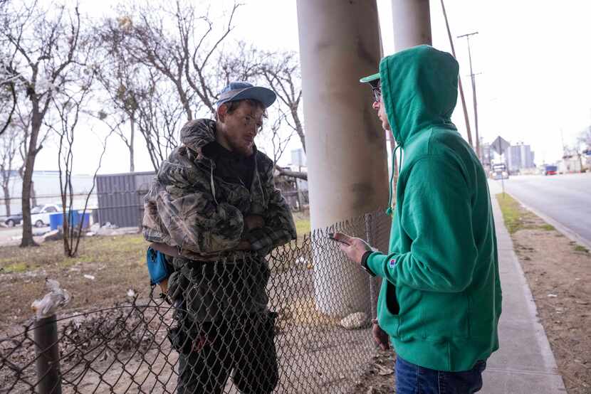 Wayne Walker (right), OurCalling executive director and pastor, spoke with "Junior" under...